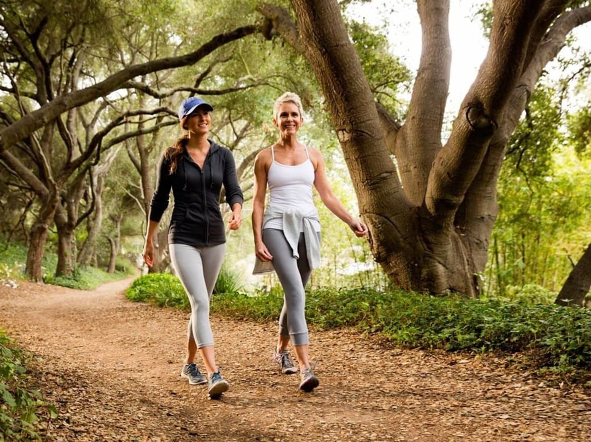 Person checking their footwear before a walk